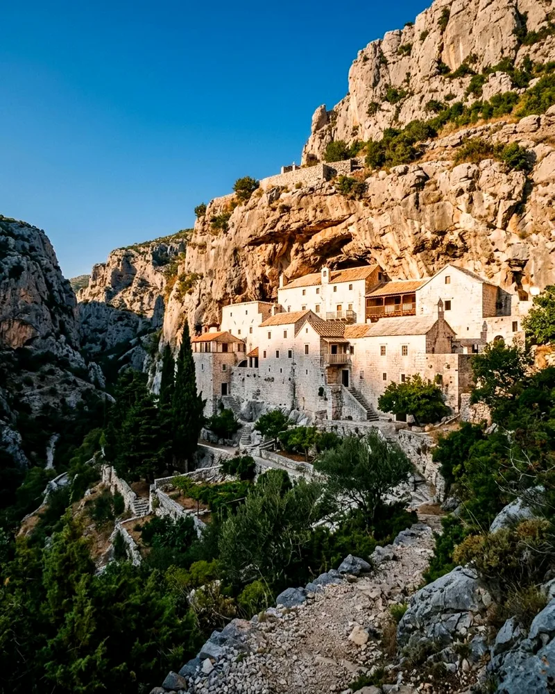 Blaca Hermitage stone monastery built into a cliff on Brač Island.
